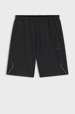 Active shorts in quick-dry fabric with reflective logo, Black