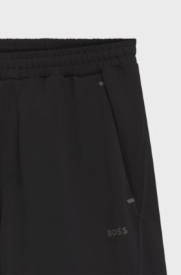 Active shorts in quick-dry fabric with reflective logo, Black