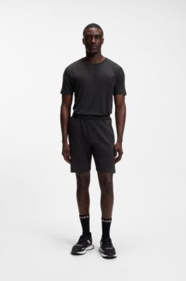 Active shorts in quick-dry fabric with reflective logo, Black