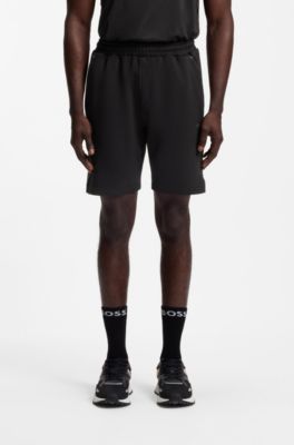 Active shorts in quick-dry fabric with reflective logo, Black