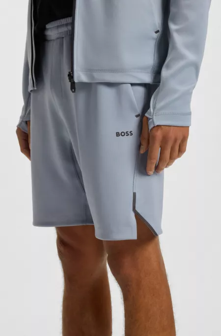 Active stretch shorts with decorative reflective details
