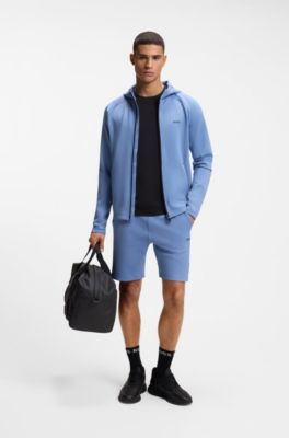 Shorts attivi in tessuto ad asciugatura rapida con logo riflettente, Celeste