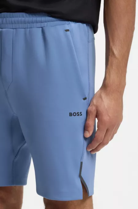 Active shorts in quick-dry fabric with reflective logo