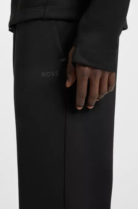 Active tracksuit bottoms in stretch fabric with moisture management