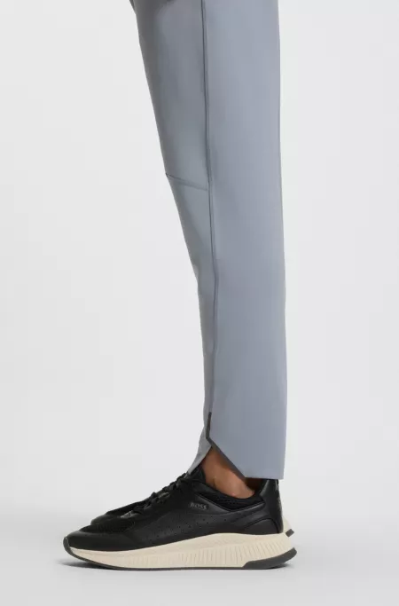 Active tracksuit bottoms in stretch fabric with moisture management
