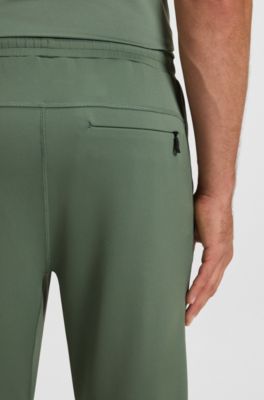 Active Quick-dry trousers with reflective branding, Green