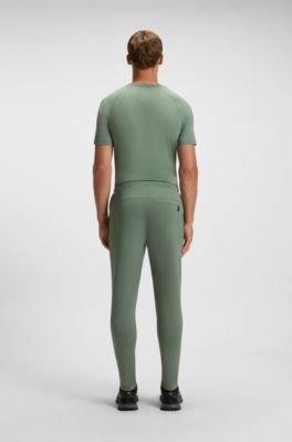 Active Quick-dry trousers with reflective branding, Green