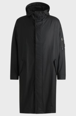 Hooded raincoat with concealed closure, Black