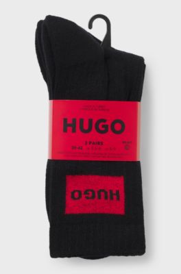 Lot de trois paires de chaussettes courtes avec &eacute;tiquettes logot&eacute;es rouges, Noir