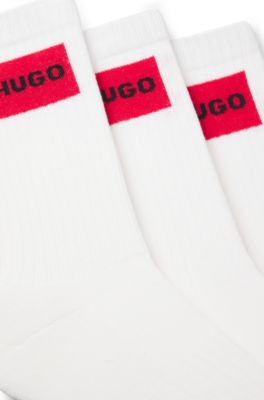Three-pack of short socks with red logo labels, White