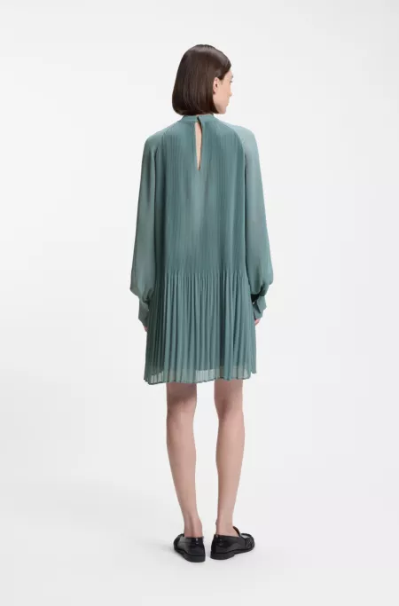 Plissé dress with sheer sleeves