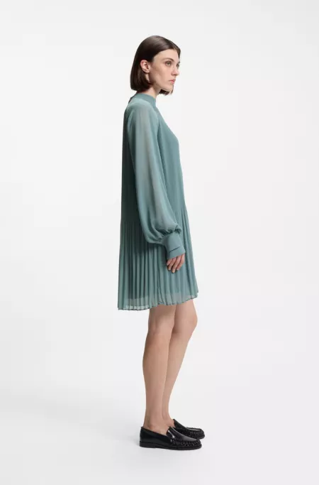 Plissé dress with sheer sleeves
