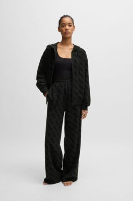 HUGO - Drawstring tracksuit bottoms with flock-printed logos - Black ...