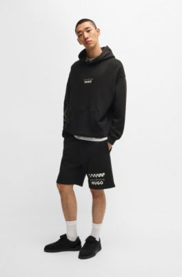 Cotton-blend shorts with racing print, Black