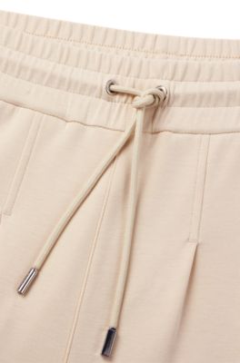 Wide-leg tracksuit bottoms with pleat details, Light Beige