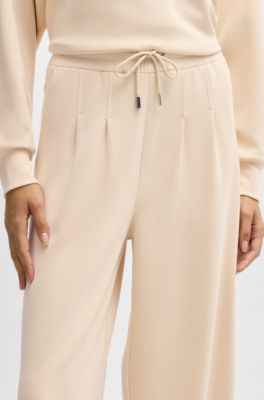 Wide-leg tracksuit bottoms with pleat details, Light Beige