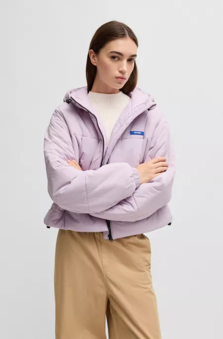 Water-repellent padded jacket with blue logo label