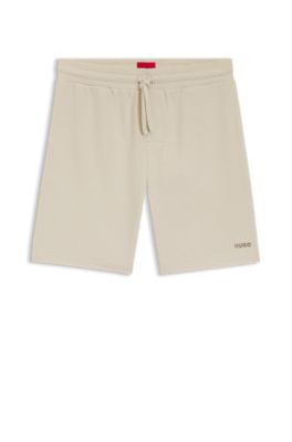 Pyjamasshorts med v&aring;ffelstruktur och broderad logga, Ljusbeige