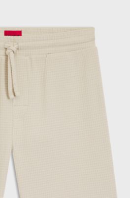 Bermuda del pigiama con lavorazione a nido d'ape e logo ricamato, Beige chiaro