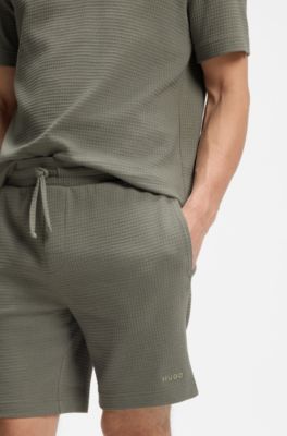 Pyjamashort met wafelstructuur en logostiksel, Groen