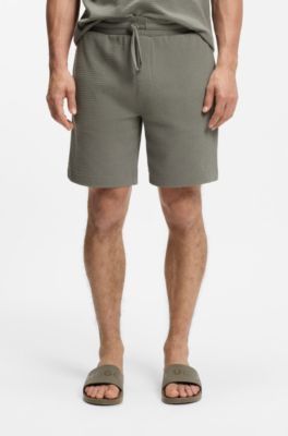 Pyjamashort met wafelstructuur en logostiksel, Groen