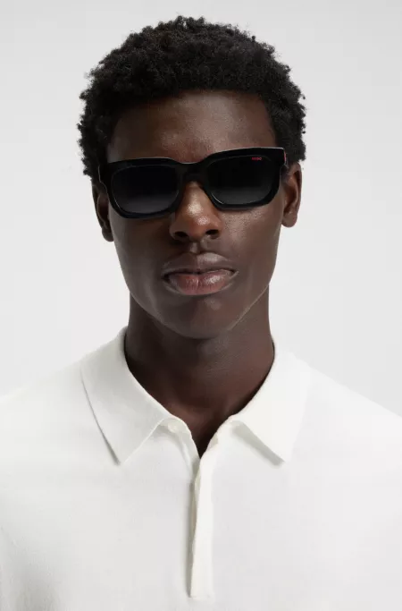 Slim-fit knit polo with concealed placket