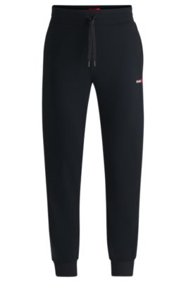 Cotton-blend tracksuit bottoms with heart logo, Black