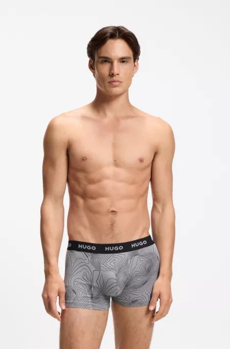 Paquete de tres calzoncillos de algodón elástico con logo