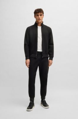 Stretch-cotton tracksuit bottoms with cuffed hems, Black