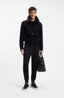Stretch-cotton tracksuit bottoms with cuffed hems, Black