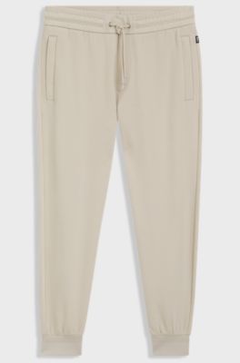 Stretch-cotton tracksuit bottoms with cuffed hems, Light Beige