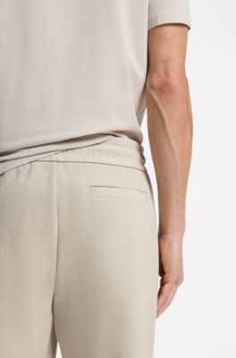 Stretch-cotton tracksuit bottoms with cuffed hems, Light Beige