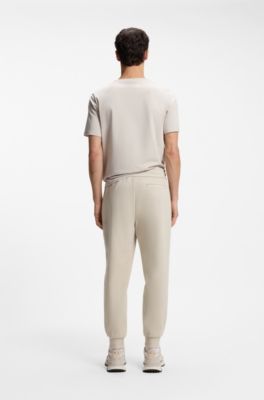 Stretch-cotton tracksuit bottoms with cuffed hems, Light Beige