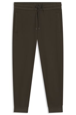 Stretch-cotton tracksuit bottoms with cuffed hems, Dark Green