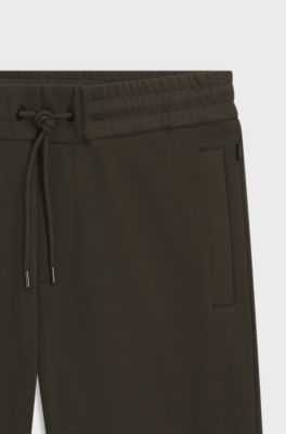 Stretch-cotton tracksuit bottoms with cuffed hems, Dark Green