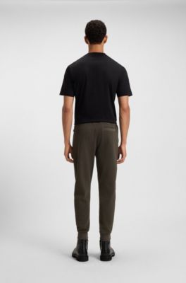 Stretch-cotton tracksuit bottoms with cuffed hems, Dark Green