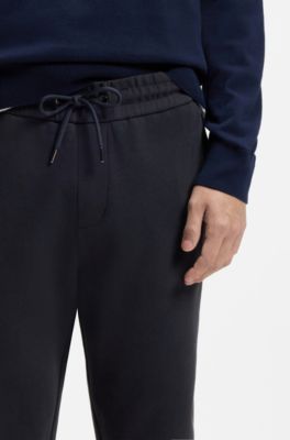 Stretch-cotton tracksuit bottoms with cuffed hems, Dark Blue