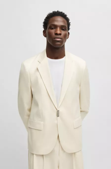 Slim-fit suit jacket with metallic logo closure