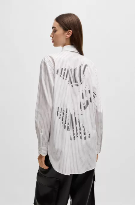 Oversized-fit blouse in striped cotton with butterfly print