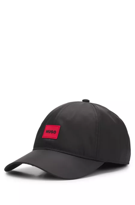 Six-panel cap with silicone logo patch