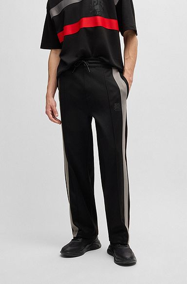 HUGO x RB oversized-fit trousers with tape and signature bull icon, Black