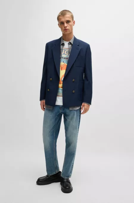 Relaxed tapered-fit jeans in mid-blue cotton denim
