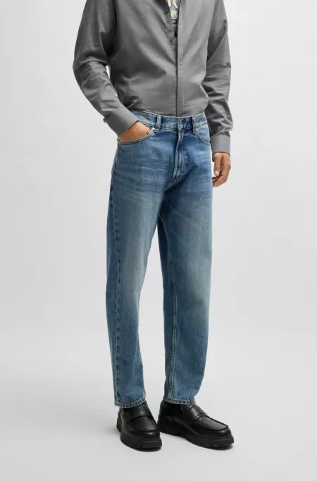 Relaxed tapered-fit jeans in mid-blue cotton denim