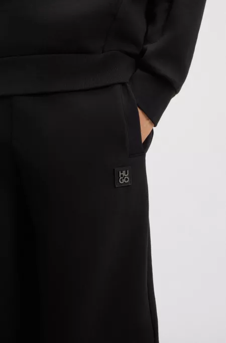 Cotton-blend tracksuit bottoms with stacked logo