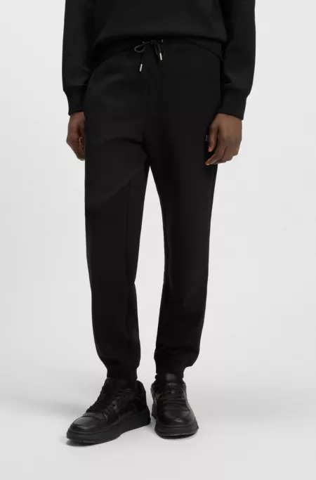 Cotton-blend tracksuit bottoms with stacked logo