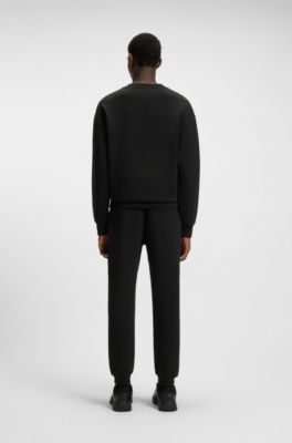 Cotton-blend tracksuit bottoms with stacked logo, Black