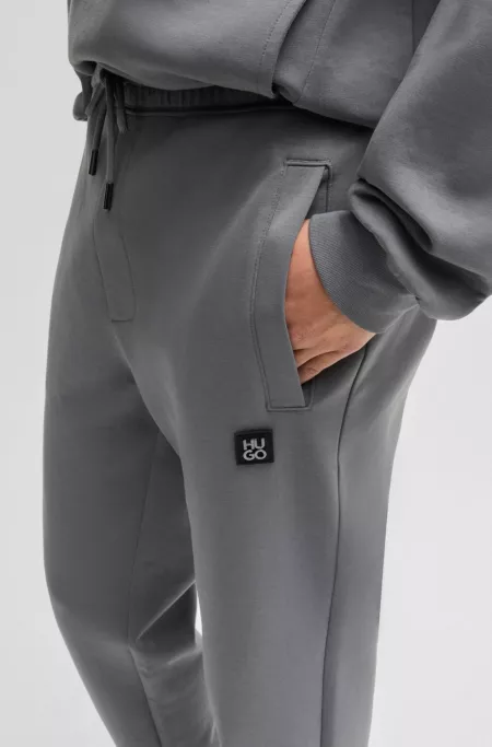 Cotton-blend tracksuit bottoms with stacked logo