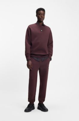 Pantaloni della tuta in misto cotone con logo scomposto, Rosso scuro