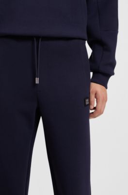 Cotton-blend tracksuit bottoms with stacked logo, Dark Blue
