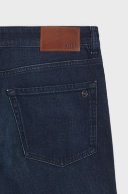 Jeans con fit affusolato in comodo denim elasticizzato blu scuro, Blu scuro